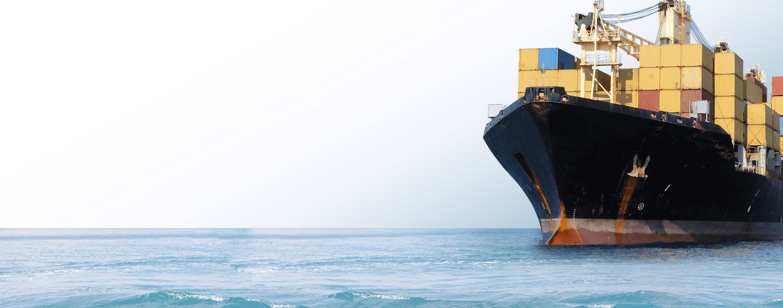 Cargo ship loaded with containers at sea